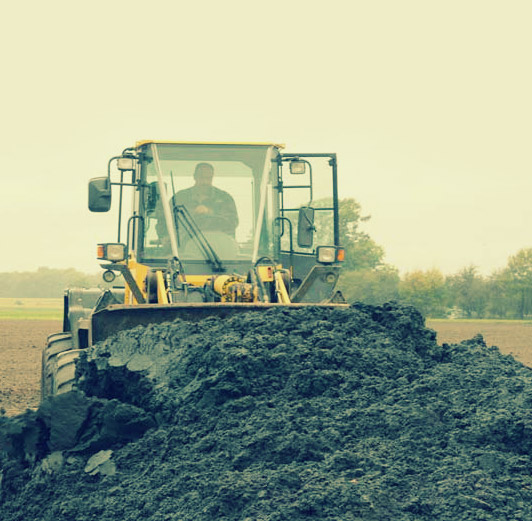 Loading treated sewage sludge a.k.a. "biosolids" containing high (ppm) levels of heavy metals, pesticides and pharmaceuticals to spread on a farm.