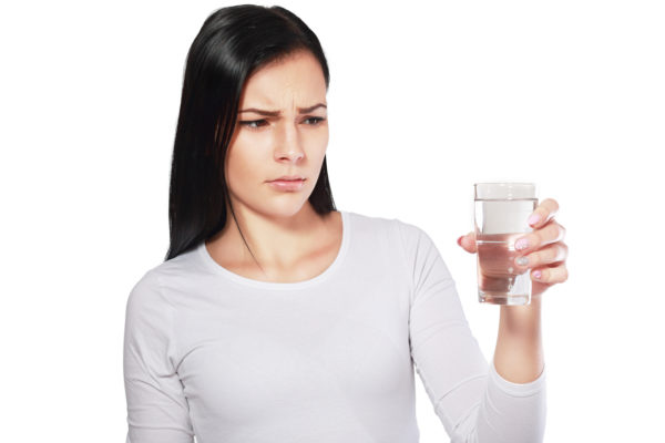 dangerous water young asian woman looking at water looking unhappy or disgusted