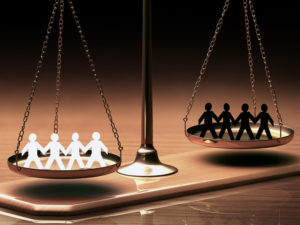 Scales of justice equaling races without prejudice or racism.