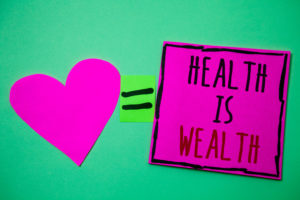 Text sign showing Health Is Wealth. Conceptual photo being in good shape great value Stay healthy eat Healthy Hart memories love pink green background love lovely thoughts message.