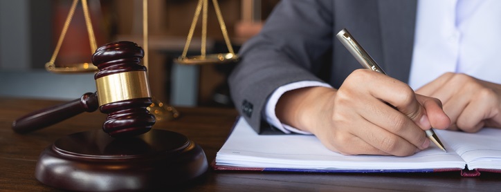 Judge gavel with Justice lawyers, Business woman in suit or lawyer working on a documents.