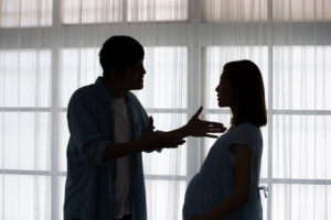 pregnant couple quarreling