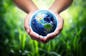 Usa in globe in hands -- save the earth.