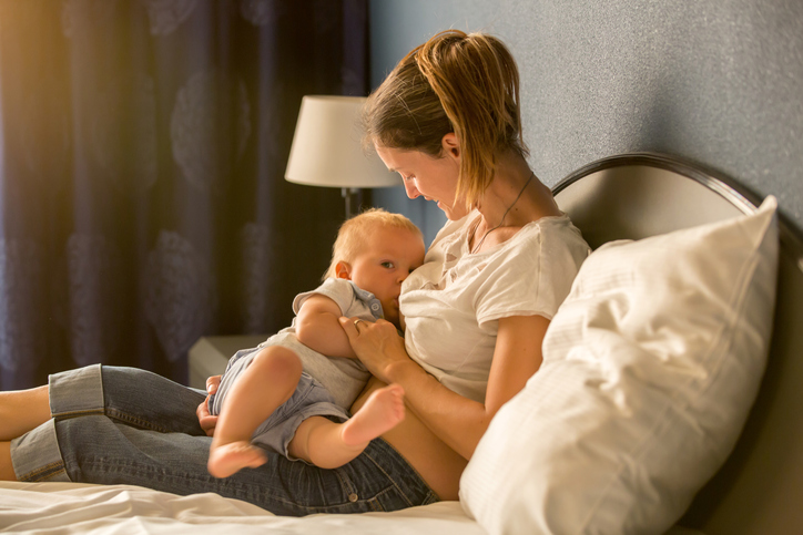 woman breastfeeding babies