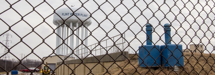 Flint Michigan Water Tower Through Chain Link Fence