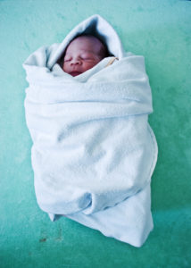 New-born wrapped in blanket