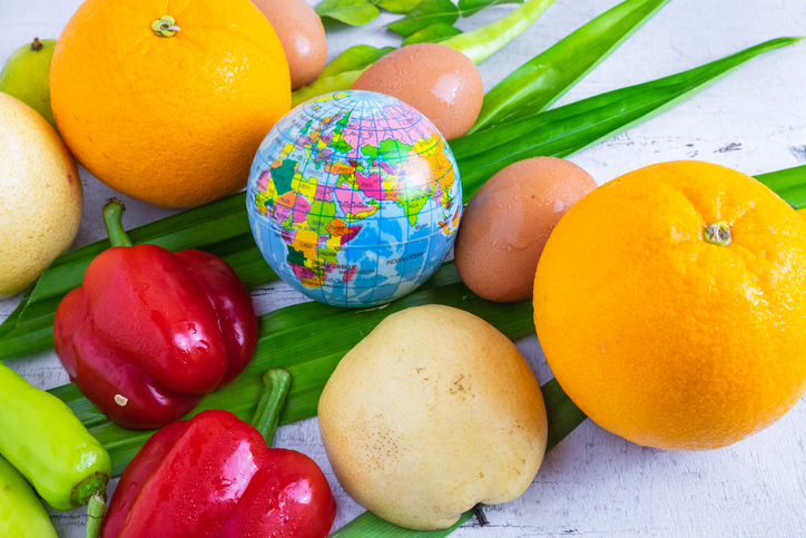 vegetables and fruit with a globe